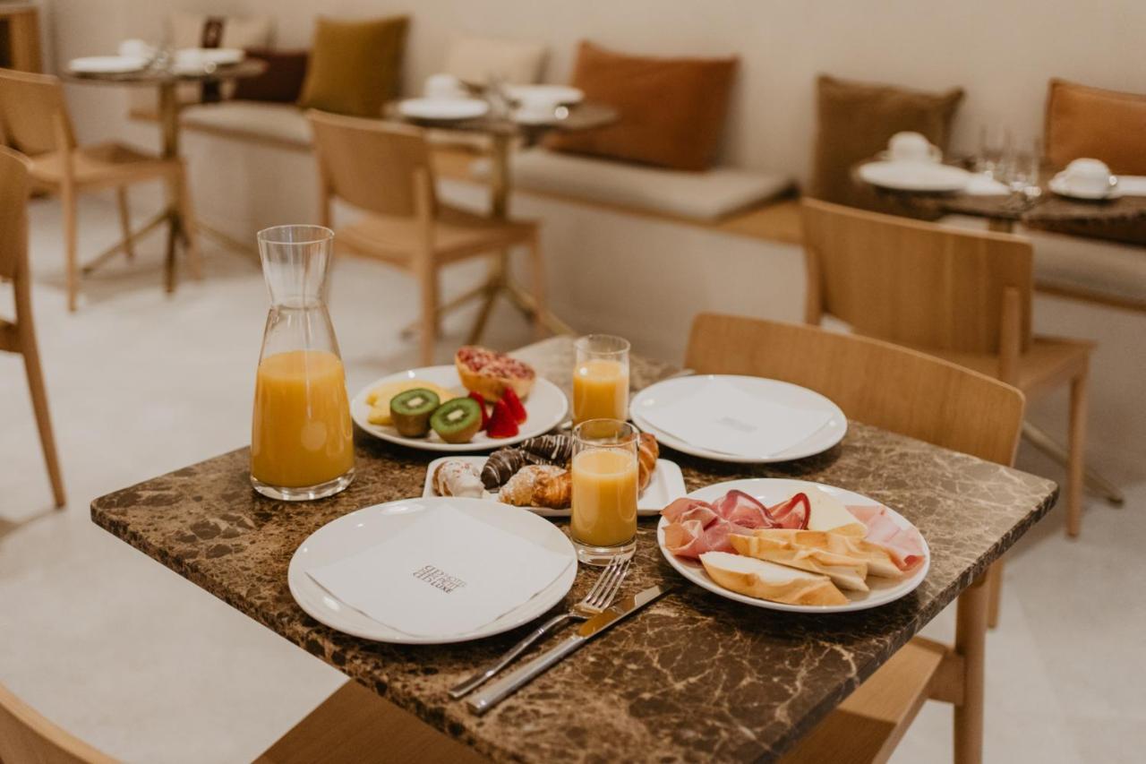 Hotel Petit Luxe Terrassa Esterno foto