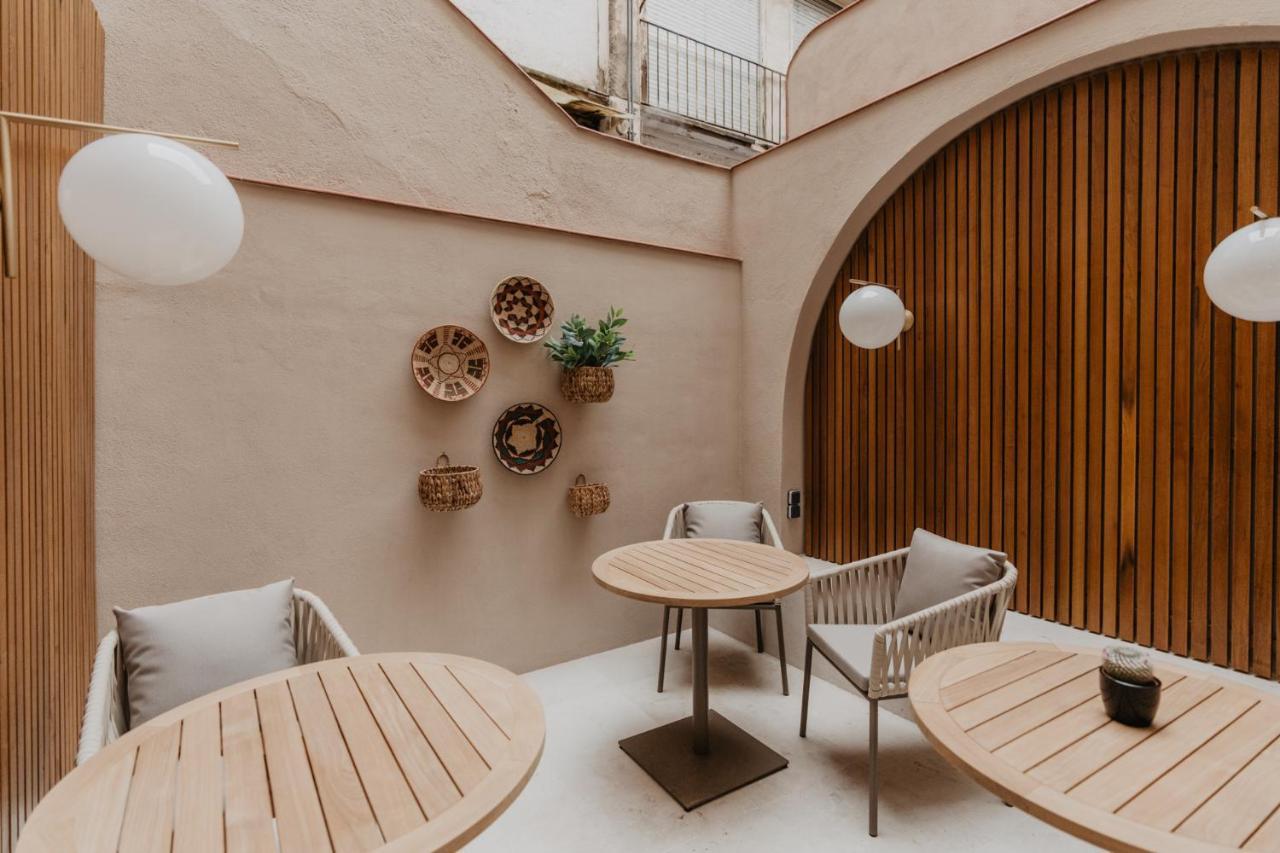 Hotel Petit Luxe Terrassa Esterno foto